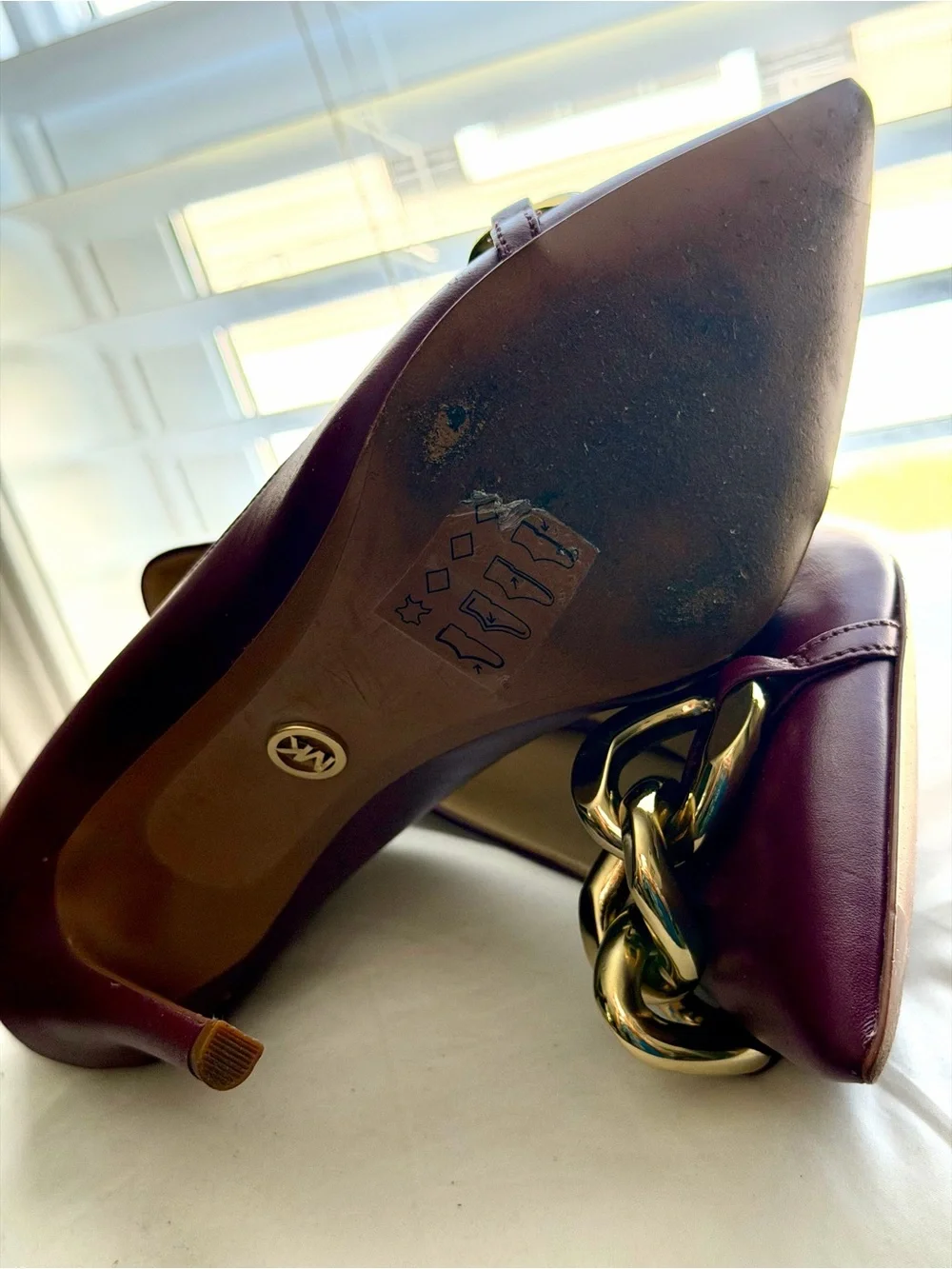 Michael Kors Burgundy Pointed Toe Pumps with Gold Chain Accent